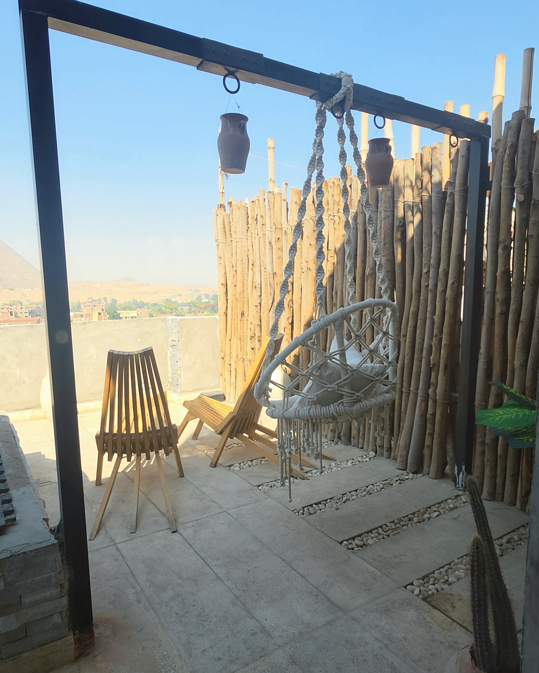 The rooftop swing looking out over the desert at Giza