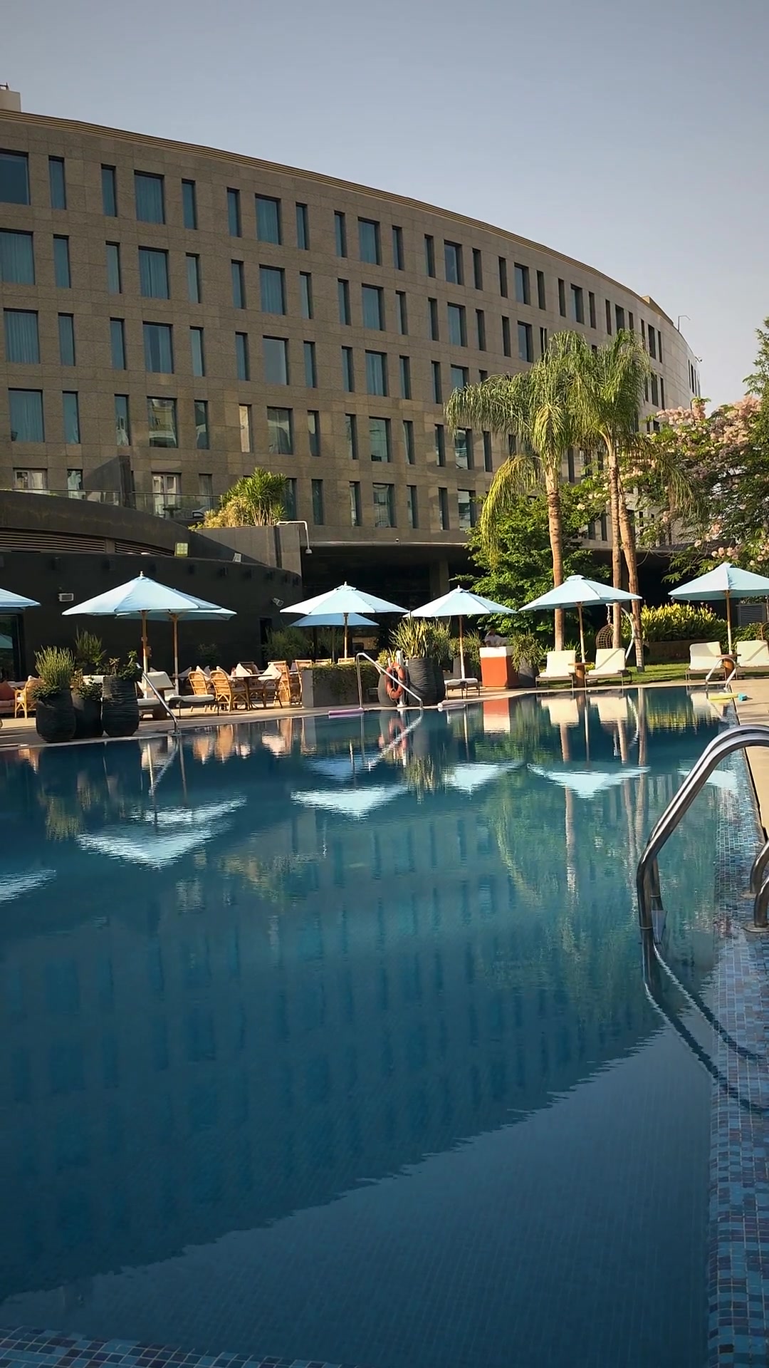 The pool at dusk at the Waldorf Astoria Heliopolis